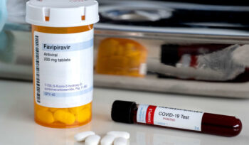 Ilustrasi obat COVID-19. Foto: Shutter Stock