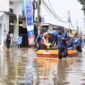 Suasana wilayah di Kota Tangerang yang Tergenang Banjir (Foto/Hms) 