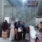 Warga Desa Kosambi Menerima Bantuan Pangan Nasional